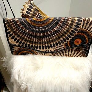 Matching Clutch To Black Fabric Shoe.